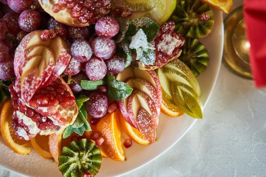 Fruit plate close-up. Healthy fruits. High-quality photo