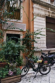 Corfu, Greece - 10.07.2021: View of the narrow streets of the historic Old Town of Corfu. High quality photo