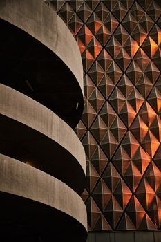 The wall of a skyscraper in the setting sun. Background