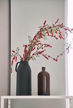 red flowers in the interior. interior detail