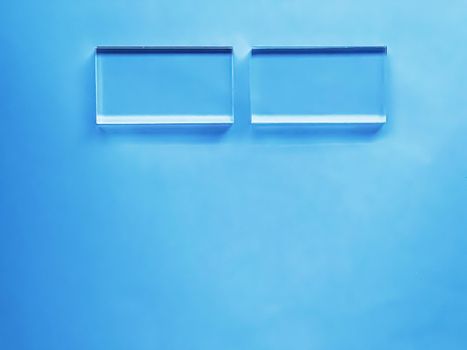 Glass device on blue background, future technology and abstract screen mockup design concept