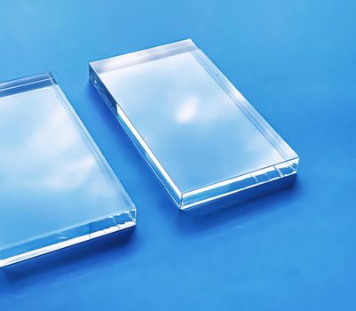 Glass device on blue background, future technology and abstract screen mockup design concept