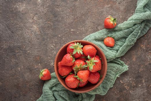 Fresh berries in a wooden bowl macro