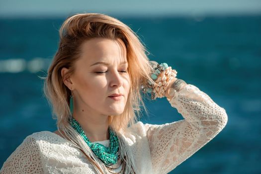 fashionable young model in boho style dress