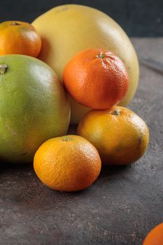Fresh ripe citrus geen orange on a dark background