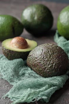 Ripe Green Avocado on a dark background
