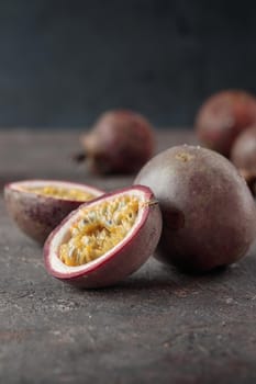 Mangostins on a dark table background