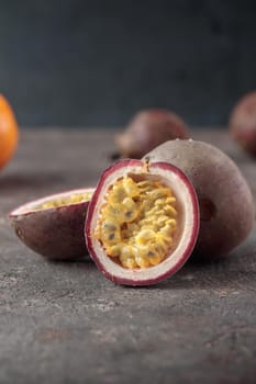 Mangostins on a dark table background