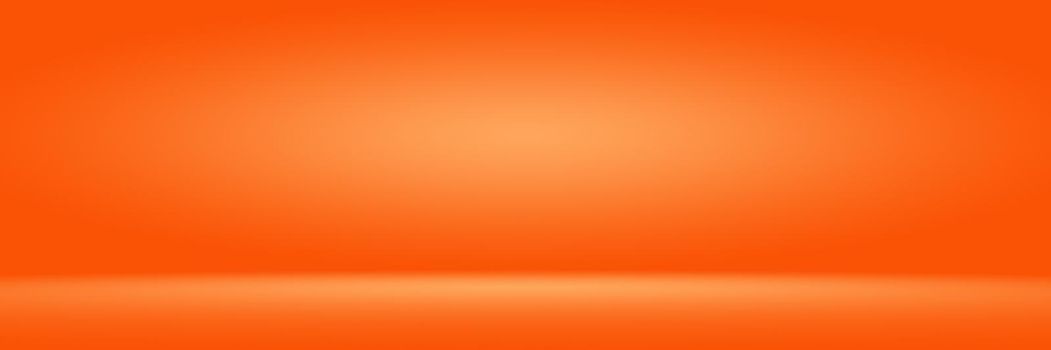 Orange photographic studio background vertical with soft vignette. Soft gradient background. Painted canvas studio backdrop