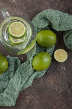 Fresh green lime and lemonade top view
