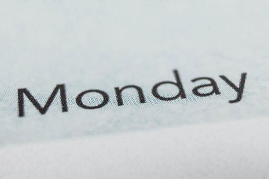 Monday, days of the week. Black and white macro shot of monthly planner - Image