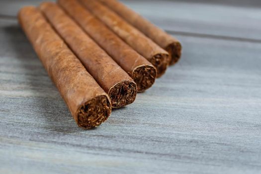 Cigars on the wooden background