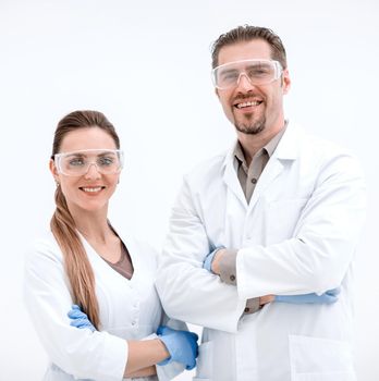 portrait of two scientists biologists on a light background