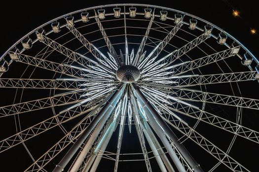 Huge observation wheel at night. View from above.