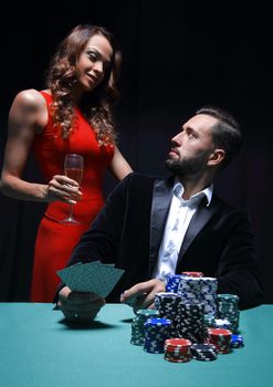 Woman advises gambler a safe bet. Risky entertainment of gambling