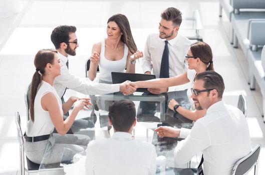 handshake business partners at the negotiating table.the concept of cooperation