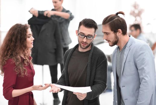 group of designers discussing the sketches.photo with copy space.