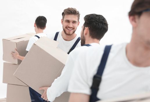 Men delivering box isolated on white.