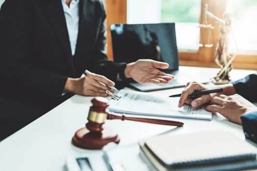 Law, Consultation, Agreement, Contract, Attorney or Lawyer holding a pen is consulting with a client to explain the pattern of answering questions before going to court to decide a lawsuit