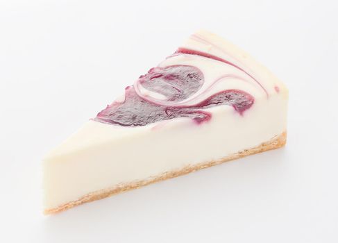 Strawberry Cheesecake slice on a white background