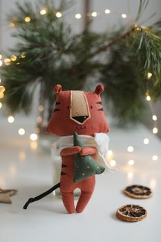 cute soft toy tiger - symbol of 2022, oriental calendar concept. High quality photo