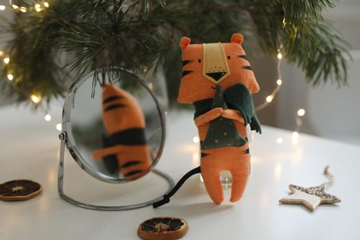 cute soft toy tiger - symbol of 2022, oriental calendar concept. High quality photo