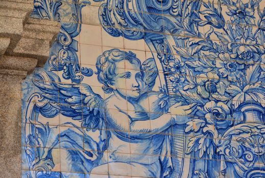 Typical old tiles of Portugal, detail of a classic ceramic tiles azulejo, art of Portugal