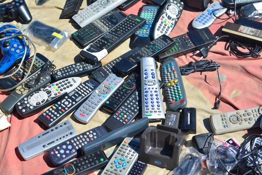 Lisbon, Portugal - August 05, 2017: Many old Remote controls at the flea market
