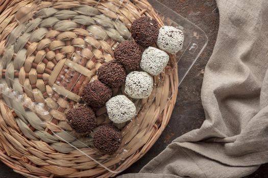 Raw chocolate homemade candies dark background