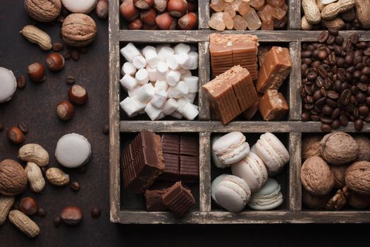 Assorted chocolate sweets in a dark box