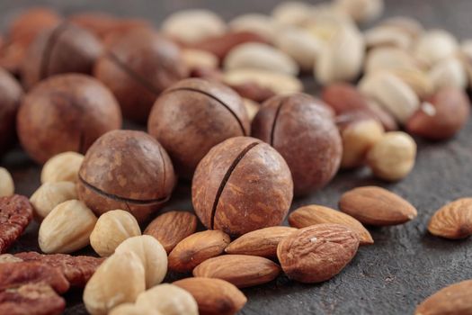 Assorted nuts macro on a dark background