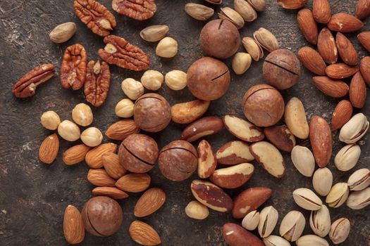 Assorted nuts macro on a dark background
