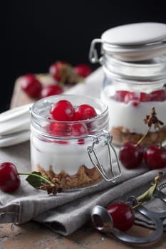 Homemade dessert with cherry in a rustic style
