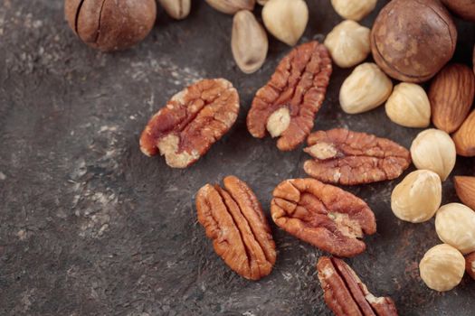 Assorted nuts macro on a dark background