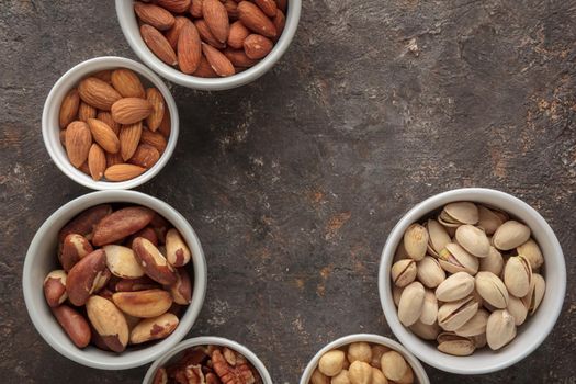 Assorted nuts macro on a dark background