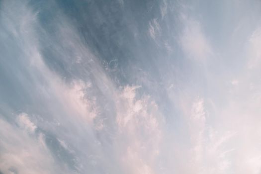 Drone flies high back in blue sky through fluffy clouds. Beautiful foggy and cloudy slow moving Aerial view. Fog sea.