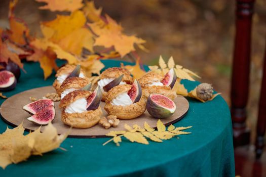 Autumn sweet dessert decorated on a table in the park