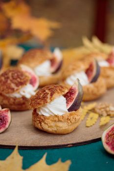 Autumn sweet dessert decorated on a table in the park