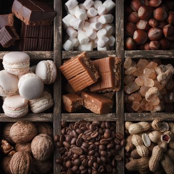 Assorted chocolate sweets in a dark box
