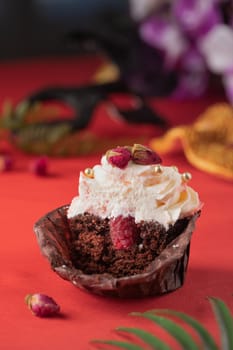 Pink and purple decoration and cupcakes on the table