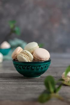 mini macaroons in a bowl on a table