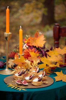Autumn sweet dessert decorated on a table in the park