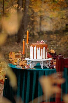Autumn sweet dessert decorated on a table in the park