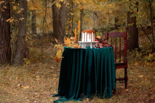 Autumn sweet dessert decorated on a table in the park