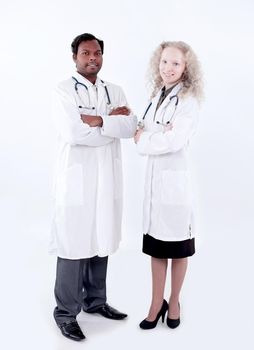 Full body portrait of two happy smiling young medical people, isolated over white background