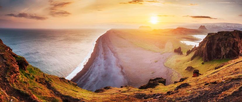 Landscape with ocean and Reynisfjall mount Iceland