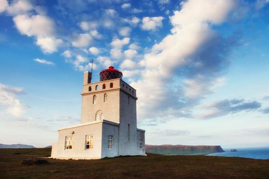 Beautiful white lighthouse at Cape Dyrholaey, South Iceland