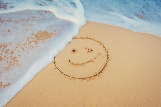 The drawings in the sand at the beach.