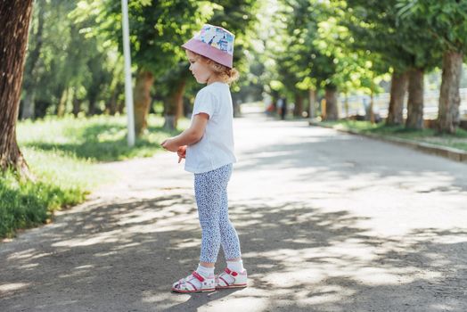 Beautiful girl in a summer sunny day.