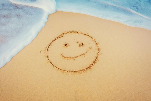 The drawings in the sand at the beach.